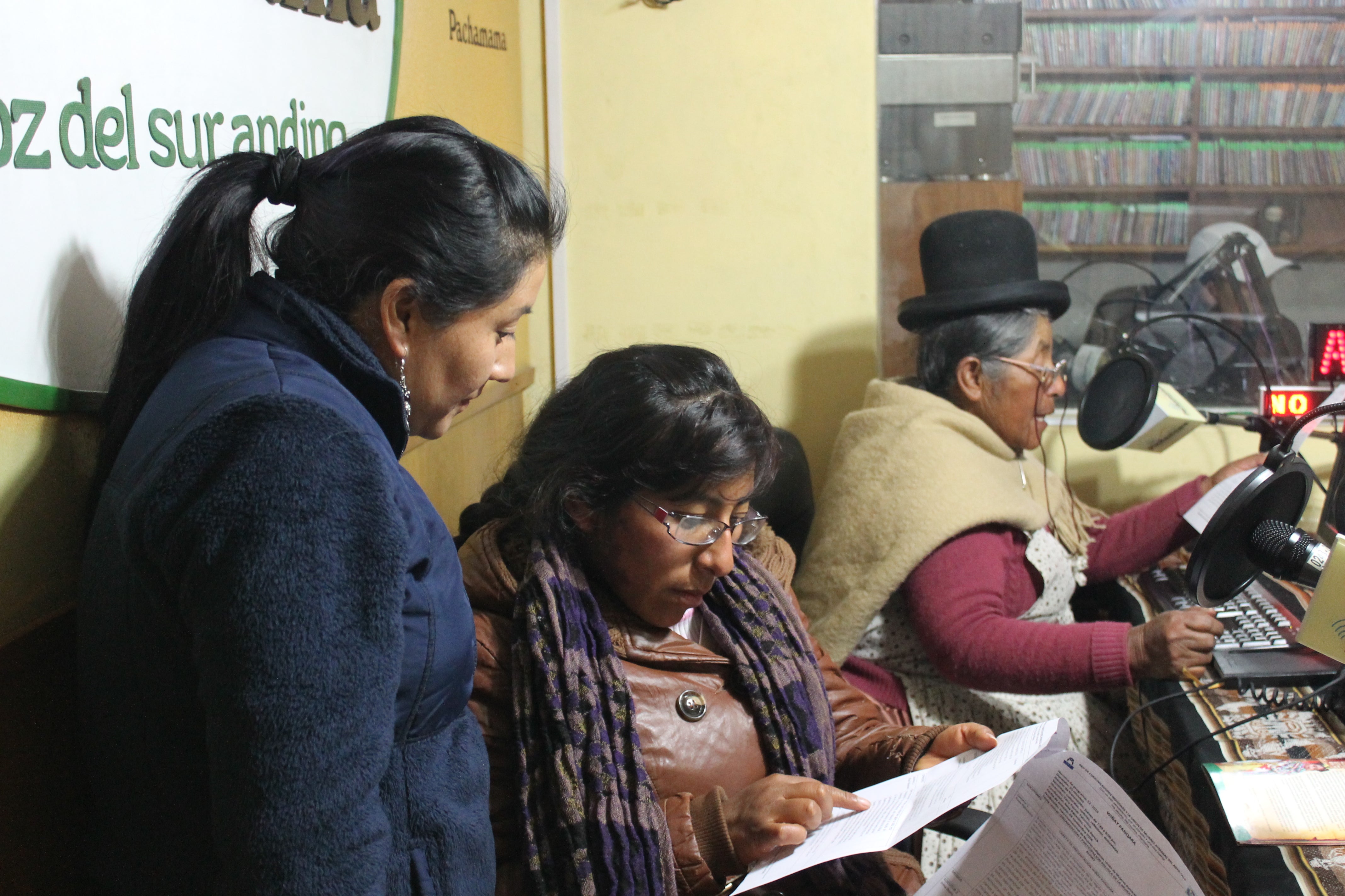 Women of UMA on air at Radio Pachamama in Puno, Peru.