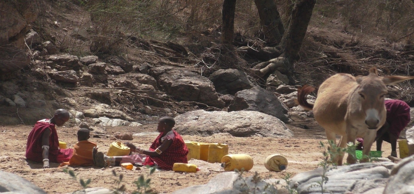 At Oloirien Village, women fetching water from dried river as they did out the sand to get water for households and livestock