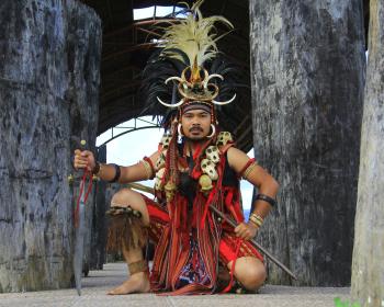 Gerard Tiwow in Minahasa traditional attire.